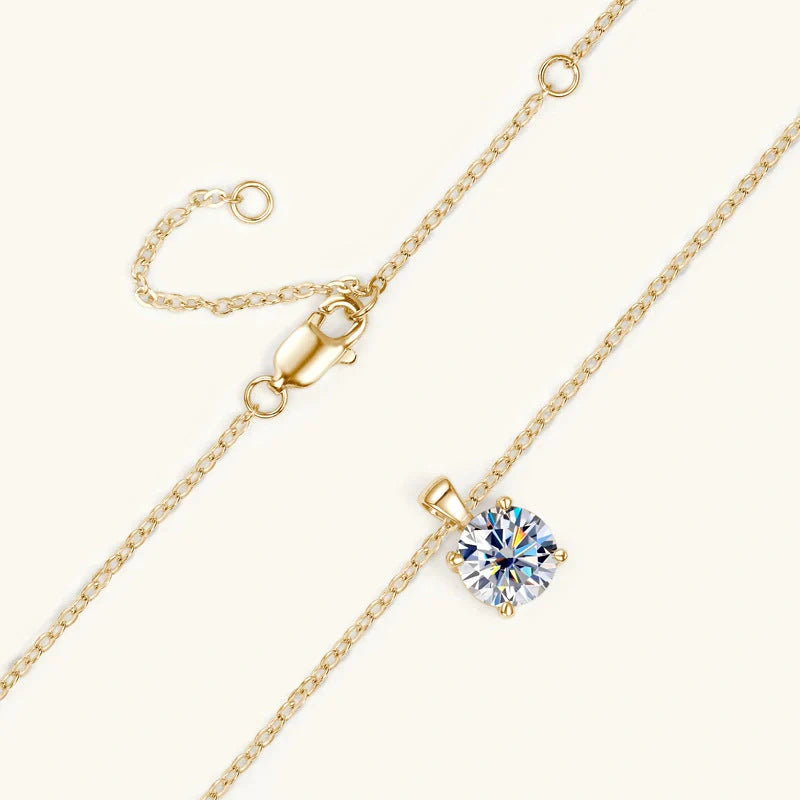 Elegant four-claw diamond necklace in silver and gold, perfect for any occasion.