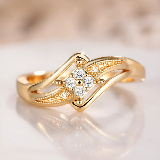 Yellow gold coloured copper diamond ring with micro inlaid zircon geometric ornamentation.