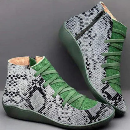 Women's casual booties with wedge heel and round toe in various colours like black and leopard print, showing rubber sole.
