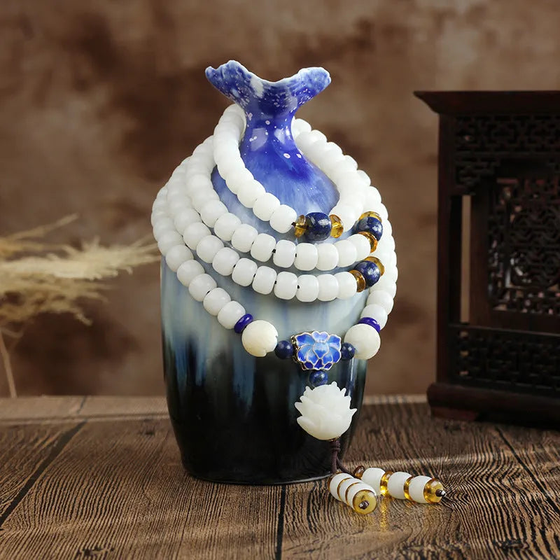 White Jade Bodhi Beads Long Bracelet for men and women in 6x8mm size featuring 9 style options including cloisonné, lotus, diamond and tassel designs in materials like red agate, blue opal and jade.