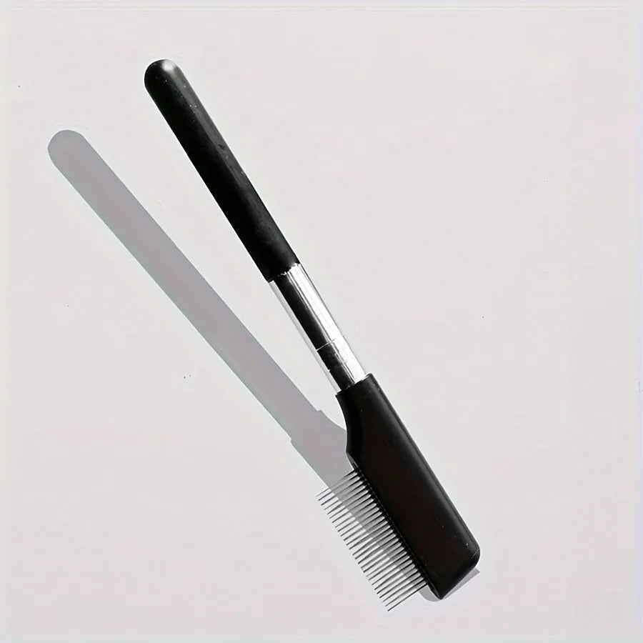 Black pet grooming brush with silicone bristles and plastic comb for dog and cat eye care.
