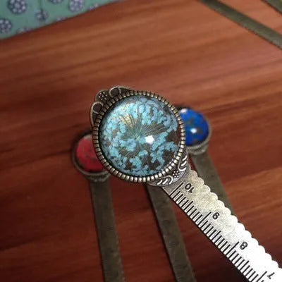 12cm handmade dried flower bookmark with gypsophila ruler featuring lace flowers, daffodils, and clover on blue background