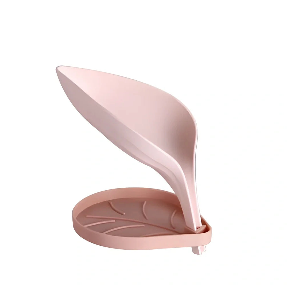 Blue bathroom soap dish with tree texture pattern and drainage channels on white ceramic sink