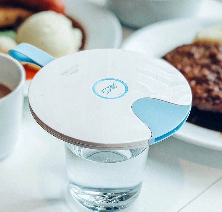 Compact USB-powered baby bottle sterilizer in blue and pink options