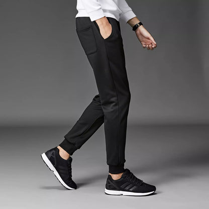 Men's winter sports pants in black and grey, made with South Korean silk fabric for warmth and flexibility