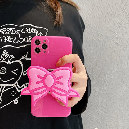 Rose red TPU iPhone case with integrated bow-shaped viewing stand