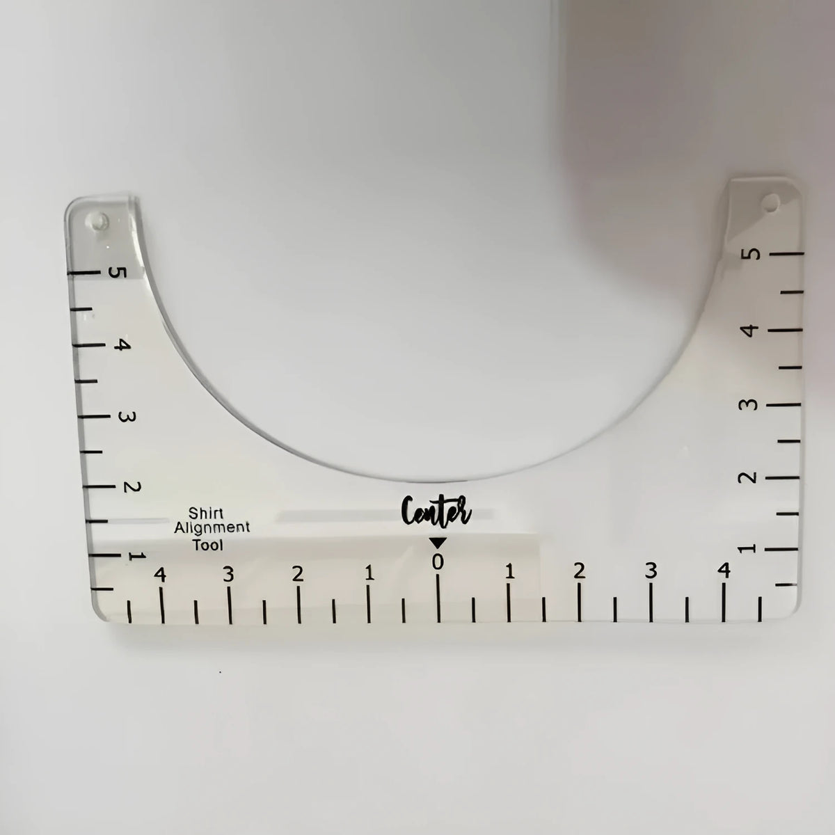 Transparent acrylic sewing patch ruler measuring 10x6 inches for T-shirt alignment