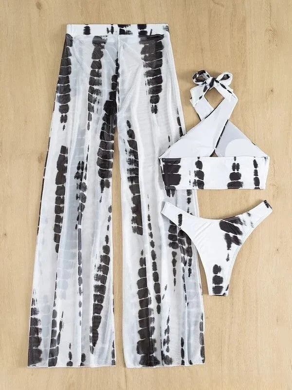 Women's black and blue printed three-piece bikini set with mesh trousers for swimming and fitness.