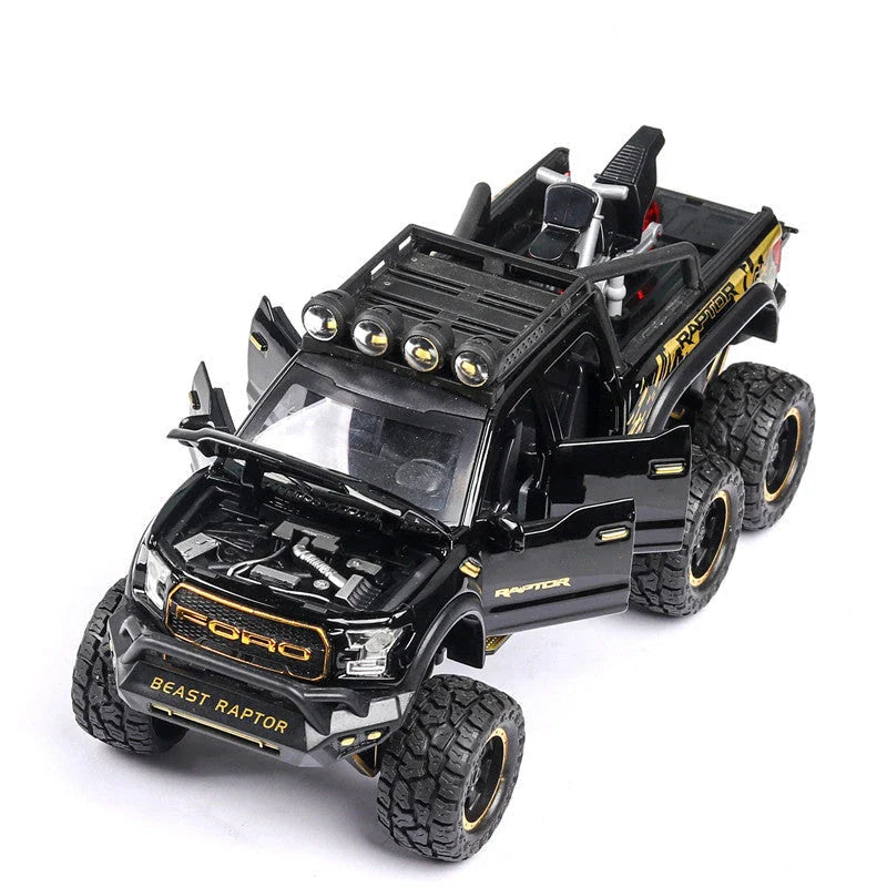 Realistic 1:28 scale Ford Raptor toy car with alloy body, lights, sounds, and pull-back action feature