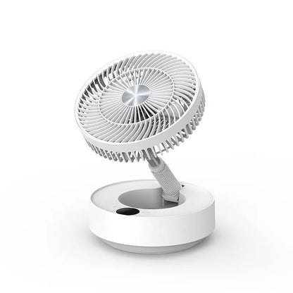 Green and white storage floor electric fan extended to vertical position with remote control