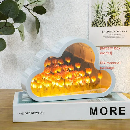 DIY tulip-shaped night lamp kit with LED lights and mirror surface in assorted colours on a desk.