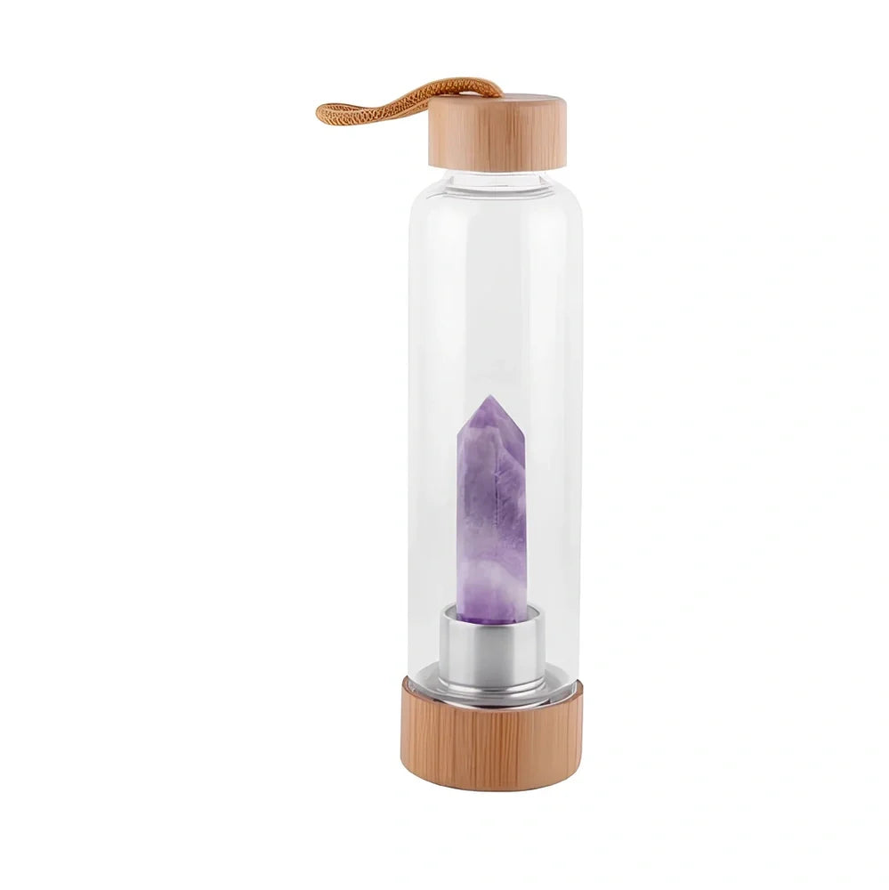 Crystal infused glass water bottle with bamboo lid showing mineral crystal inside 25cm tall container