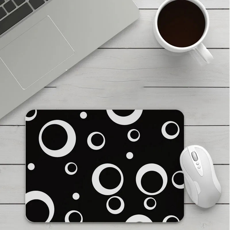 Customisable thick cartoon mouse pad with non-slip base, showing sample patterns like strawberry, cat, and whale designs.