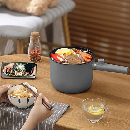 Compact Electric Fondue Pan with adjustable temperature settings for versatile cooking