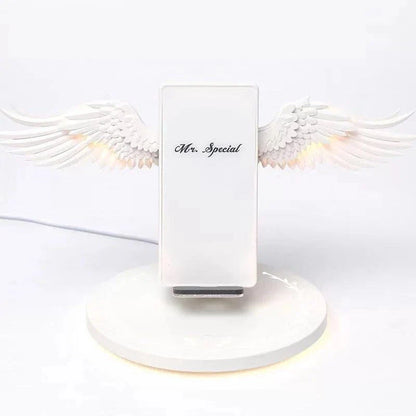 Angelic wireless charger with unfolding wings, providing fast charging and elegant design for smartphones