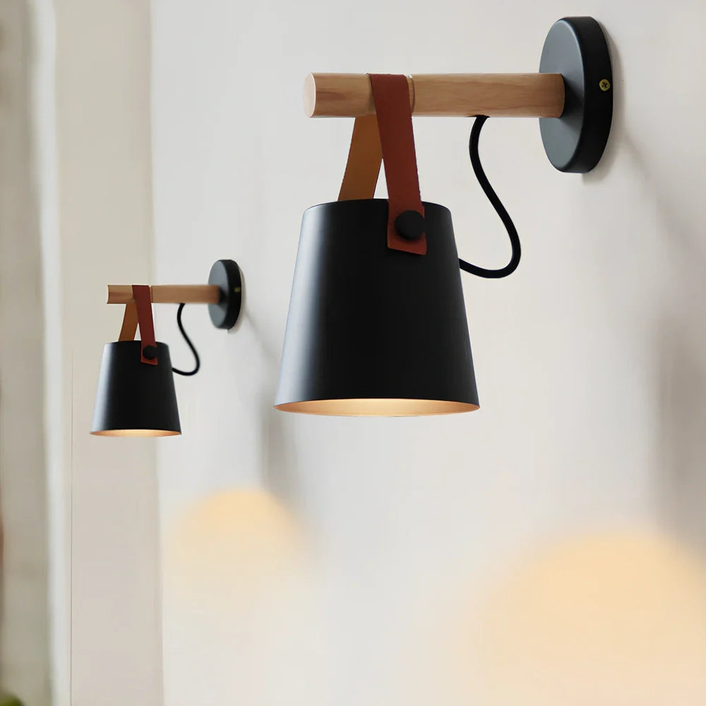 Scandinavian wall lamp with iron shade measuring 220mm by 130mm in black finish