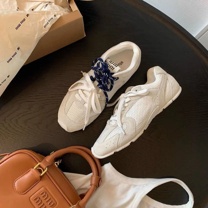 Women's retro German training casual shoes in Milky White colour with round toe and lace-up closure