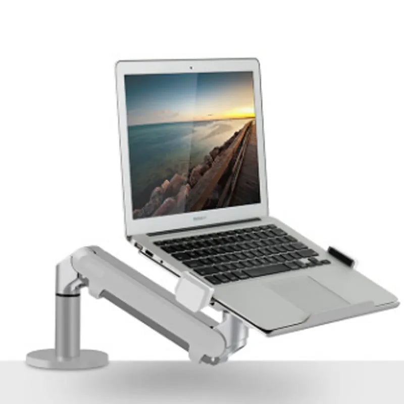 Silver aluminium alloy laptop stand holding a notebook on a desk