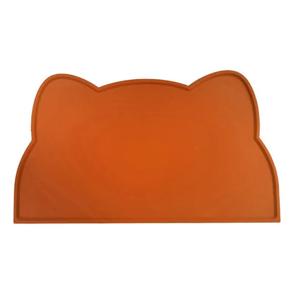 Blue silicone pet feeding mat in cat head shape for dog and cat food bowls
