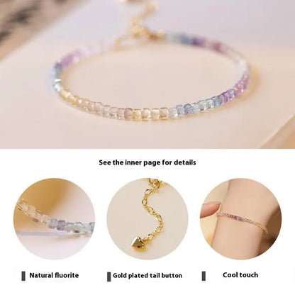 Women's handmade bracelet with rainbow fluorite stones in copper geometric quadrilateral settings