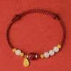 Women's adjustable bracelet with Hetian jade, cinnabar red rope and 925 silver chain