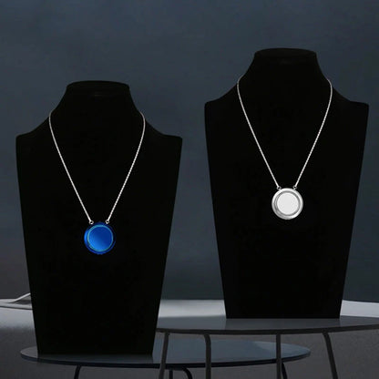 Portable negative ion air purifier necklace in blue, white, and silver