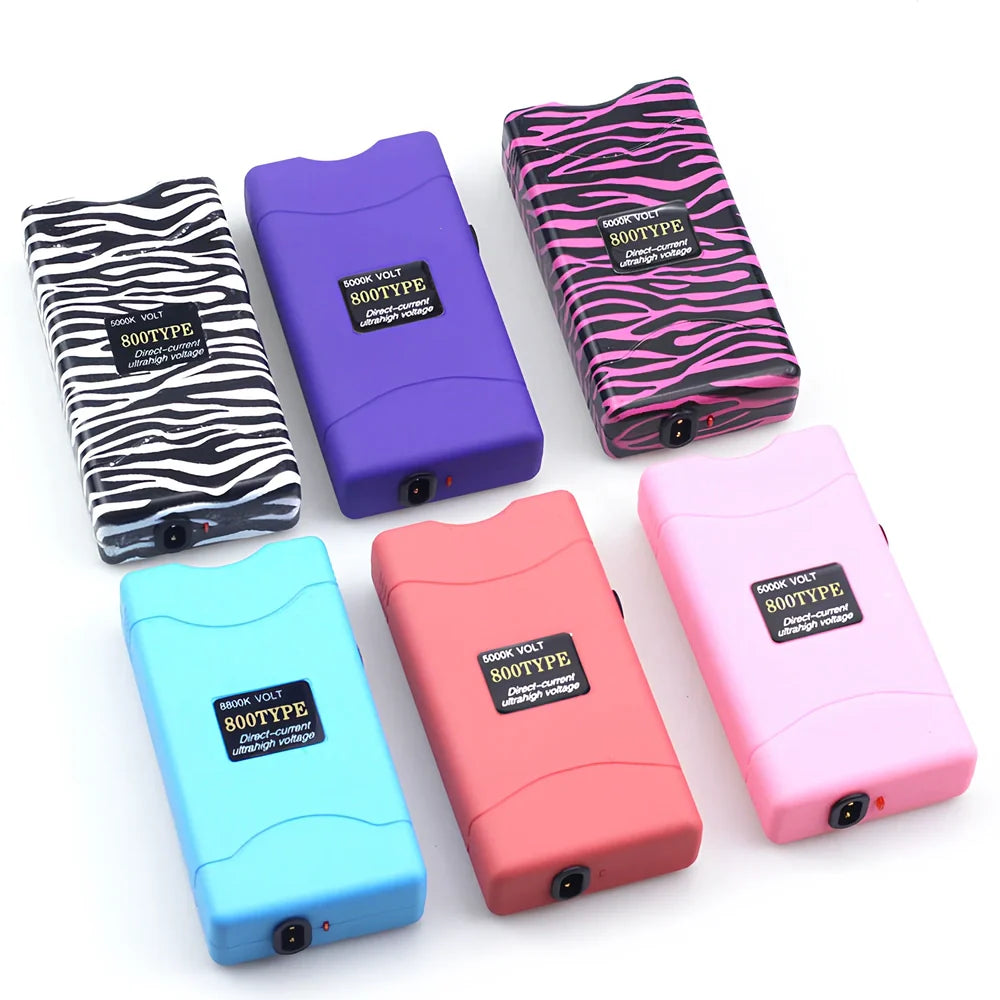 Purple self-defence torch with 100-lumen LED and emergency alarm function measuring 15cm