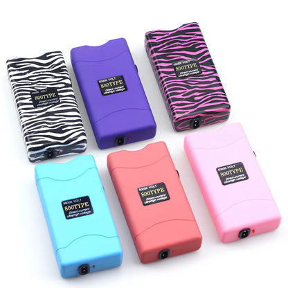 Purple self-defence torch with 100-lumen LED and emergency alarm function measuring 15cm