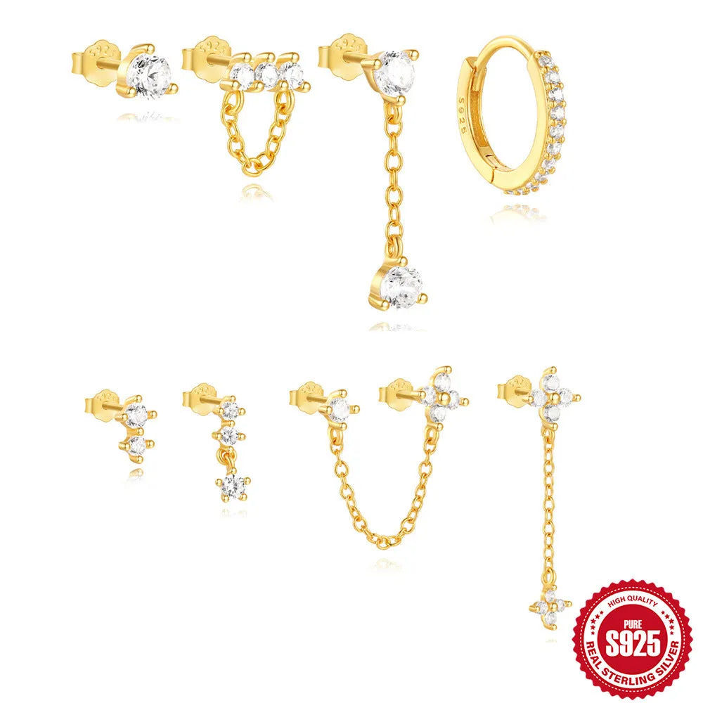A pair of geometric clover petal shaped earrings in gold, made from S925 sterling silver with an electroplated finish.