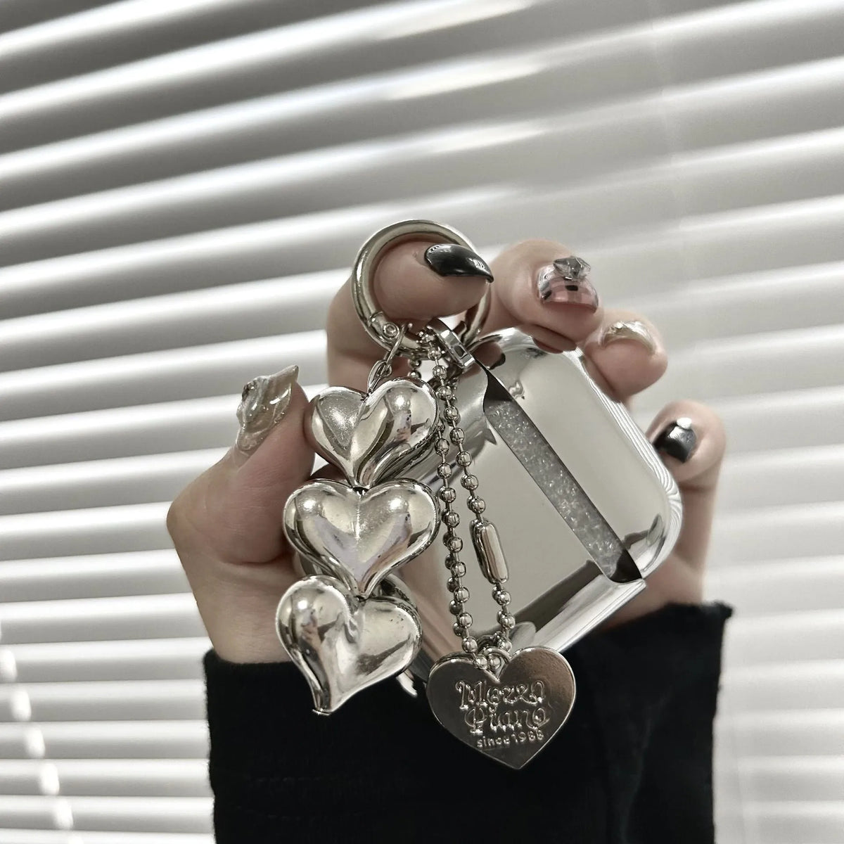 Electroplated solid colour heart pendant charm on a soft TPU iPhone case for 12, 3, Pro, Pro2 models