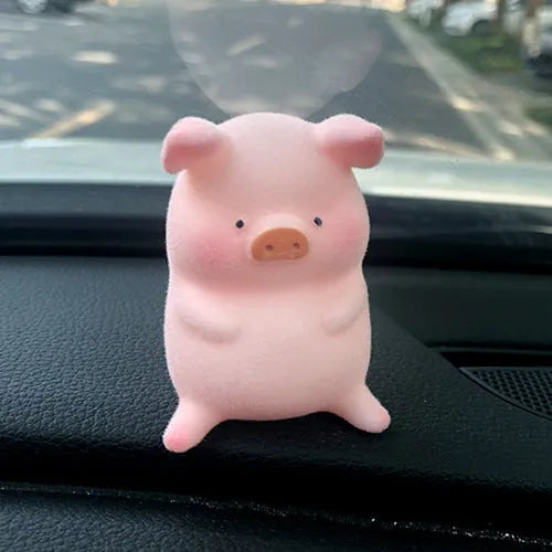 Resin cartoon pig car decoration in various styles, approx 8-10cm, for dashboard personalisation