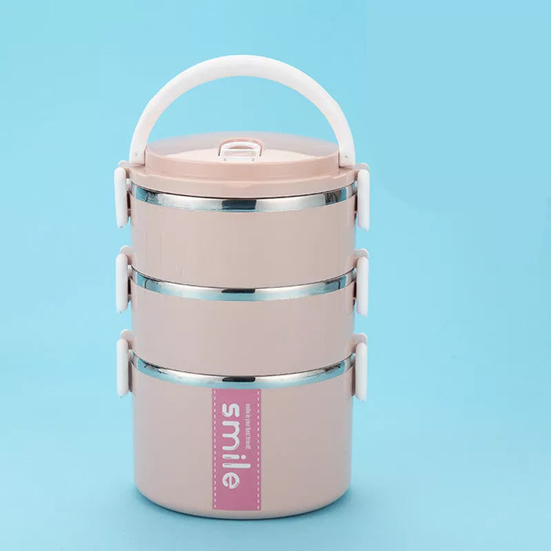 Stainless steel lunch box with built-in spoon, leak-proof design, available in green, pink, and blue