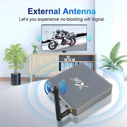 Android smart TV set-top box with remote control and HDMI cable on a wooden surface.