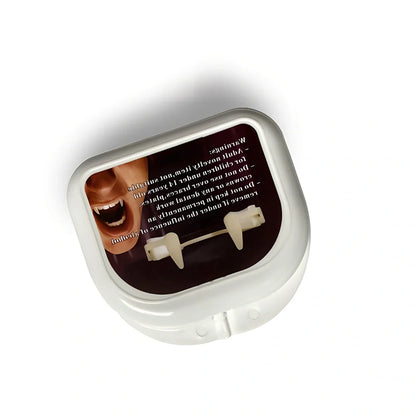 Retractable vampire teeth showing extended 2cm fangs with spring mechanism