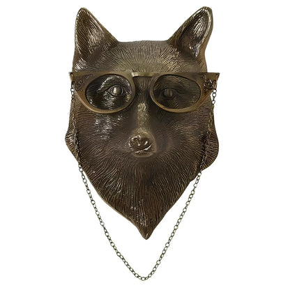Antique bronze animal pendant showing bear design with synthetic resin construction