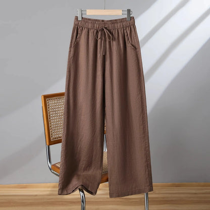 Women's straight-leg casual trousers with elastic waistband and drawstring closure in polyester fabric
