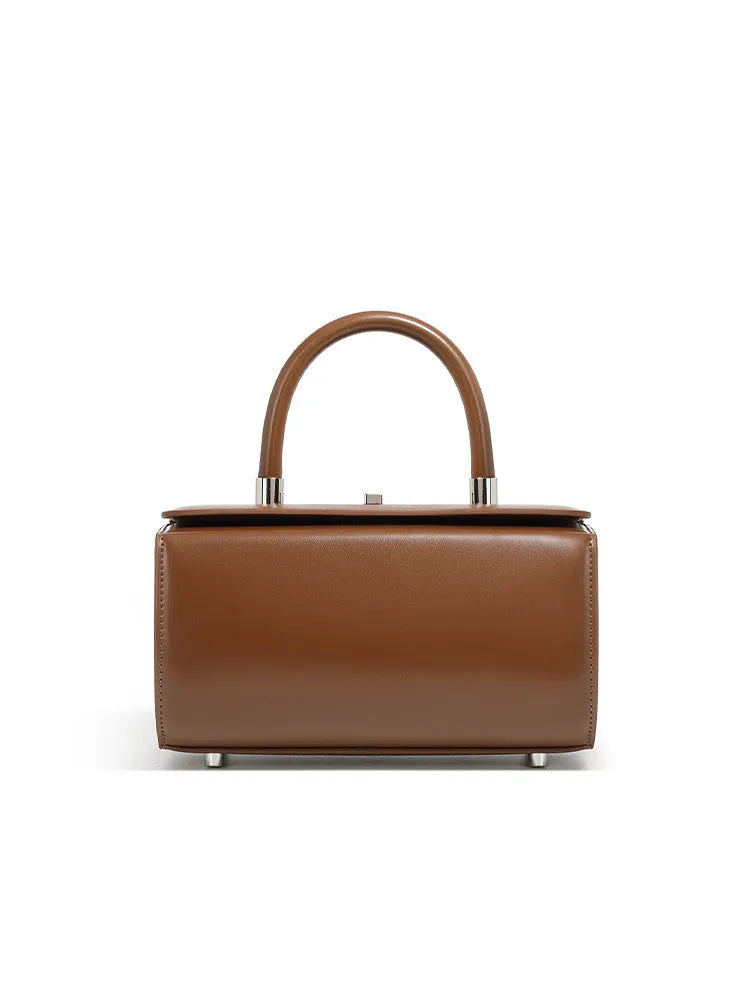 Genuine cowhide leather women's crossbody bag with clamshell opening and internal organisation compartments