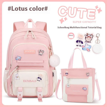 Pink waterproof Oxford cloth school backpack for girls with curved shoulder straps, shown with matching pencil case.