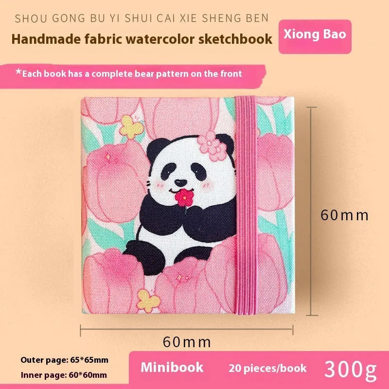 Feiluniao watercolour notebook with fabric cover, 185mm length, open to show paper for painting.