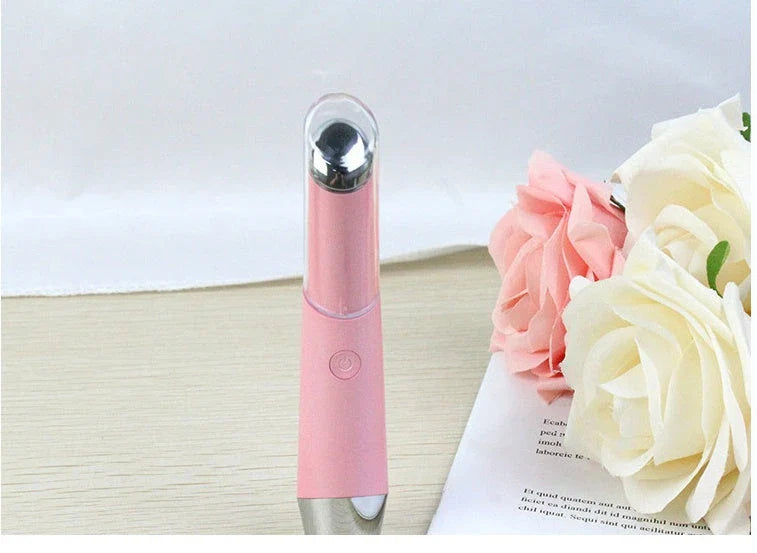 Vibrating eye massager with heat therapy to reduce dark circles and wrinkles