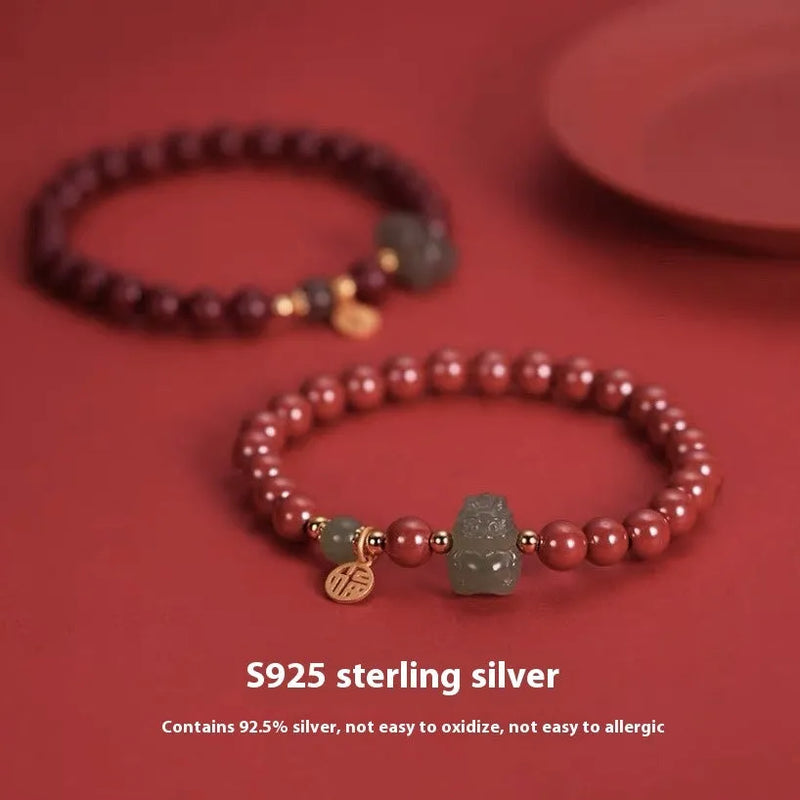 Hetian Jade bracelet for men and women featuring an 8mm round jade bead design, crafted with a choice of Emperor Sandstone Style or Purple Gold Sand Style, this hand-made natural animal or zodiac themed bracelet comes as a single piece.