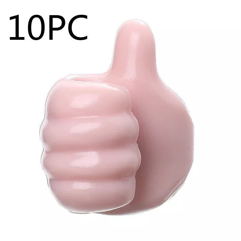 Silicone thumb wall hooks in various colors for organizing kitchen and bathroom items