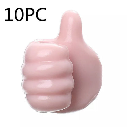 Silicone thumb wall hooks in various colors for organizing kitchen and bathroom items