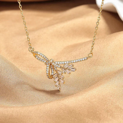 Women's wheat tassel necklace with leaf-shaped pendant and O-shaped chain in silver and gold