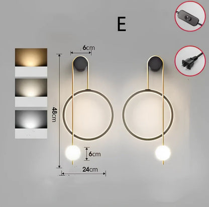 Nordic wall lamp with black gold finish and LED lighting, mounted beside bed with dimming controls