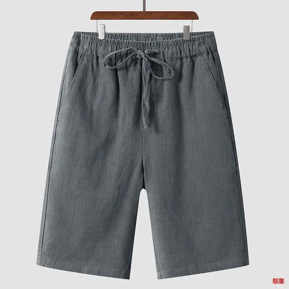 Men's linen casual shorts with elastic waistband in loose cropped design showing beige colour option