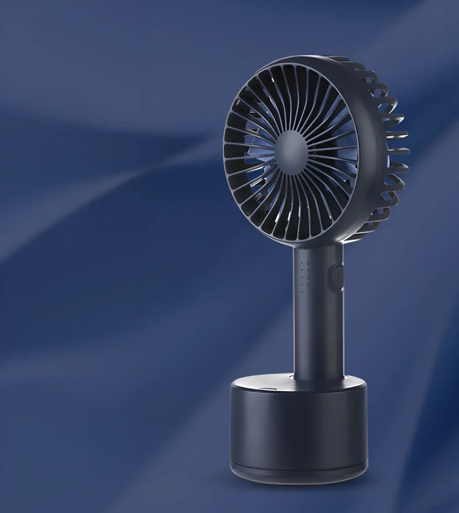 Blue shaking head handheld fan showing oscillating mechanism and USB charging port