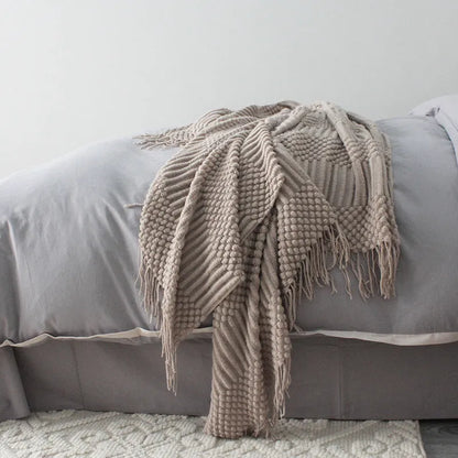 Polyester small blanket shown in dark grey, measuring 127 by 170 centimetres.