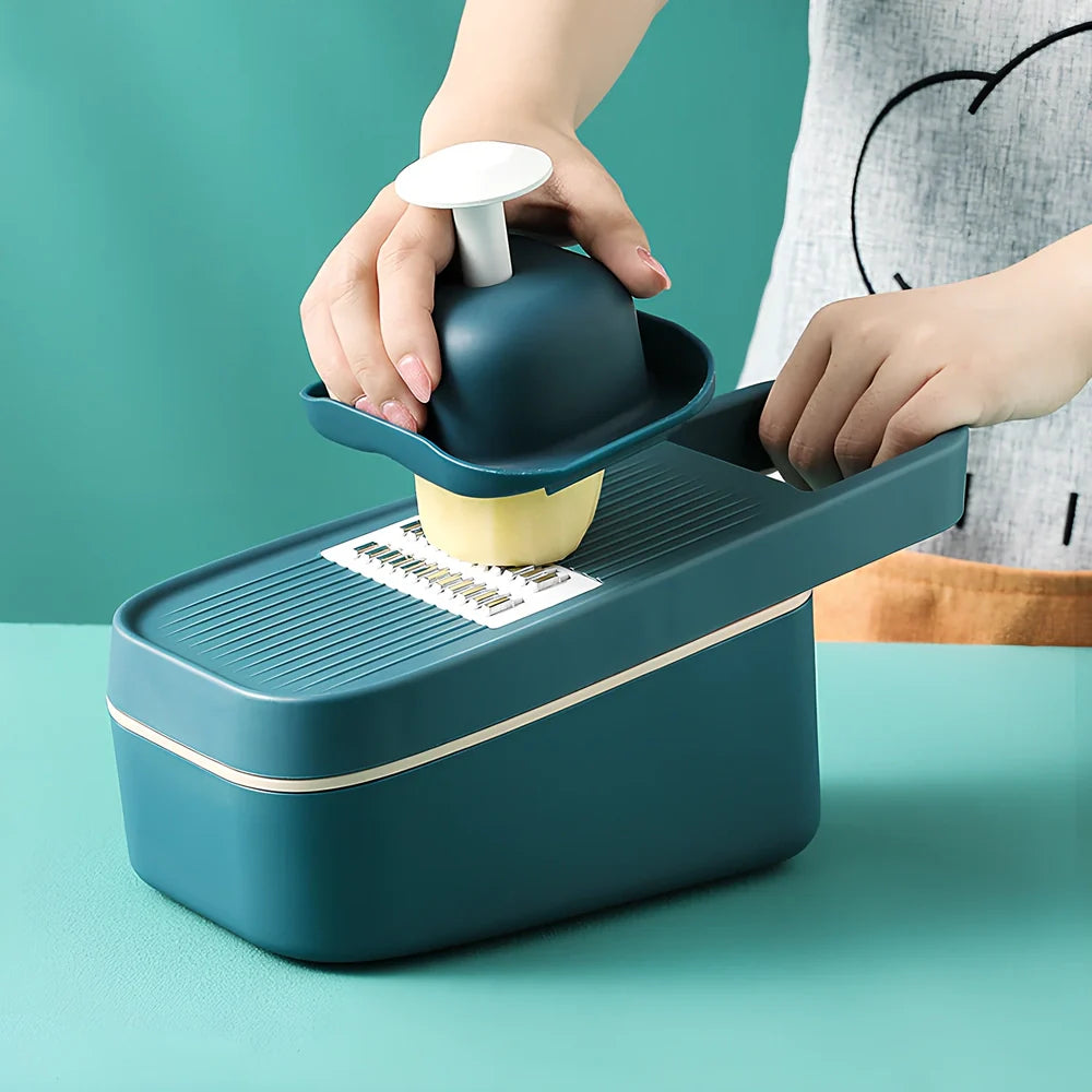 Blue multi-function kitchen cutter with stainless steel blades for slicing and shredding vegetables