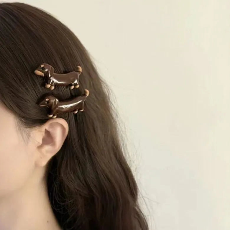 Dachshund dog design cute hair barrettes with a loose delicate style on a mixed material clip.
